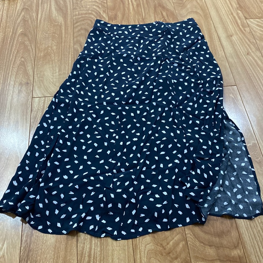 Calf length skirt with slit